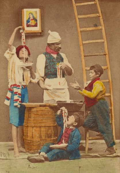 Unidentified man with moustache making pasta, three boys either eating it or helping..., 1865-1870. Creator: Giorgio Conrad.