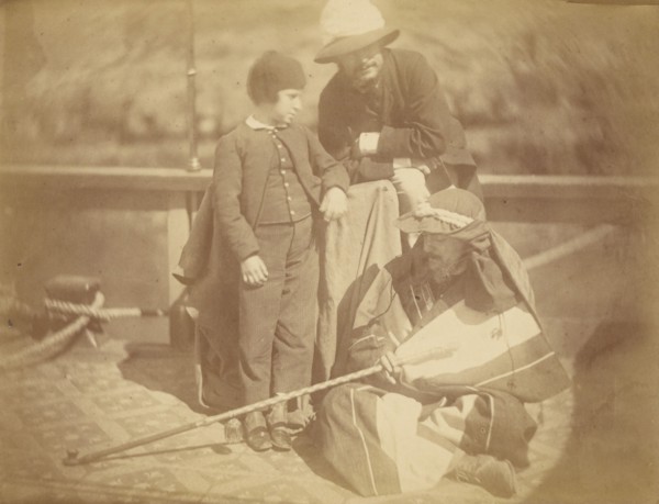 Group Portrait of Two Occidental Men and a Boy on a Boat in the Nile River, 1865. Creator: Théodule Deveria.