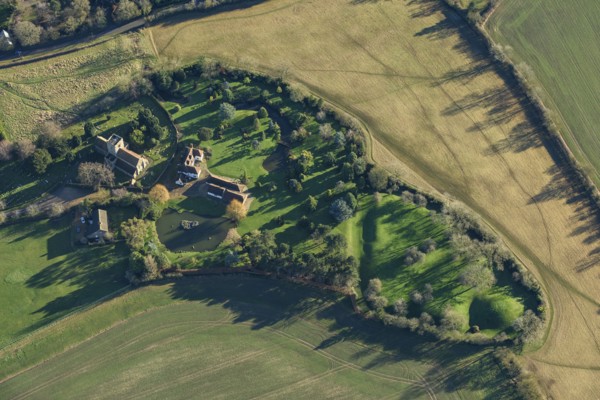 The Hills, the earthwork remains of a castle, homestead moat and church, Bedfordshire, 2022. Creator: Damian Grady.