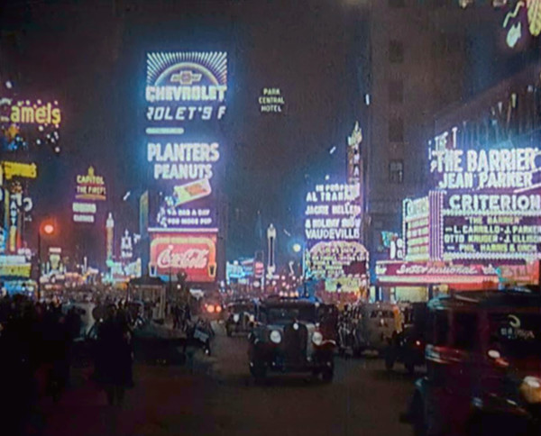 New York Times Square at Night Lit up By Lights, 1920s. Creator: British Pathe Ltd.