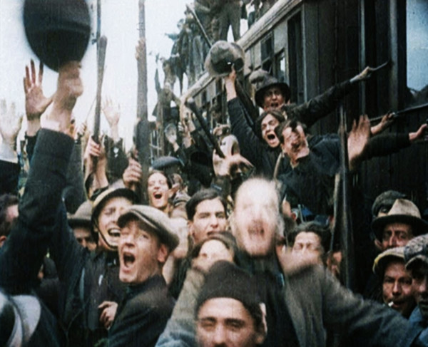 Italian Soldiers Standing on or Near a Train, Waving and Cheering, 1922. Creator: British Pathe Ltd.