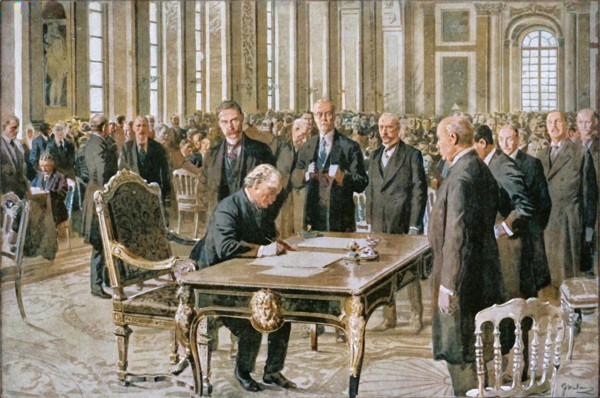 'The Prime Minister of Great Britain Signing the Peace Treaty', 1919. British Prime Minister David