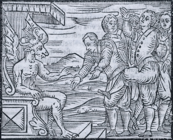 Sorcerers paying homage to the devil, 1608. The horned and winged devil sits on a throne receiving