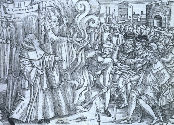 The burning of Thomas Cranmer, Archbishop of Canterbury, 1556, (1563). As he is burned alive,