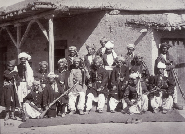 Kabul Police, Afghanistan, c1880. Police with rifles outside a mud-built building.