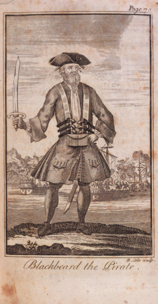'Blackbeard the Pirate'. 1724. The engraving shows Blackbeard in costume, heavily armed and holding