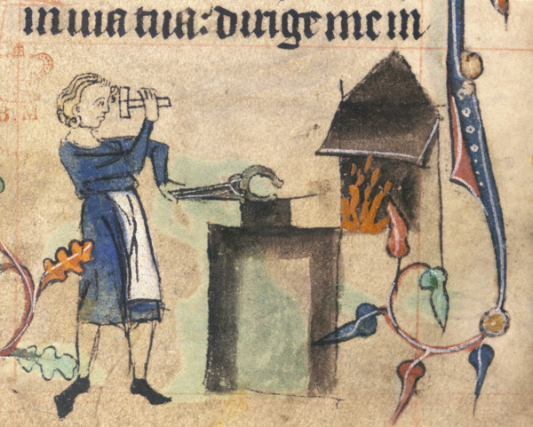 Blacksmith, 15th century. Wearing an apron and hammering a horshoe. A fire can be seen burning in