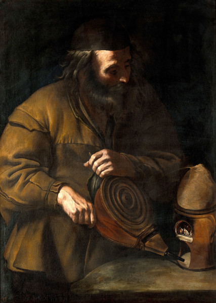 An alchemist applying bellows to a fire beneath a retort, 18th (?) century. Creator: Unknown.