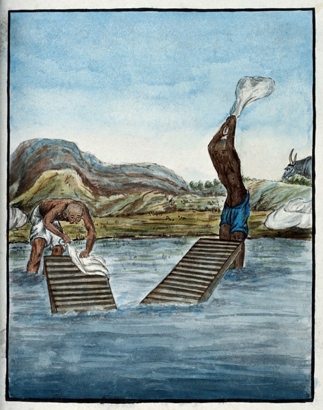 Two washer-men cleaning clothes by beating them against washing racks in a river. Creator: Unknown.