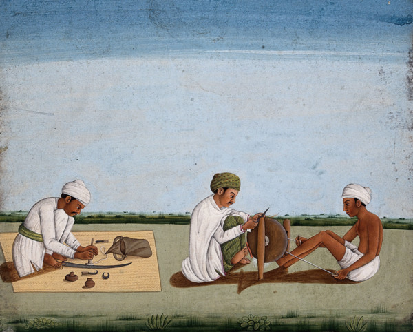 Two men sharpening a knife whilst the third prepares the blade on a sword, (between 1800 and 1899?). Creator: Unknown.