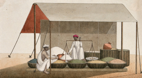 A shopkeeping weighing grains for a customer, (between 1800 and 1899?). Creator: Unknown.
