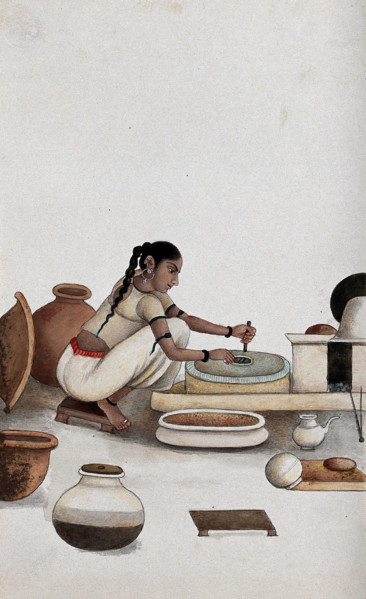 Delhi: a woman grinding grain into flour, (between 1800 and 1899?). Creator: Unknown.