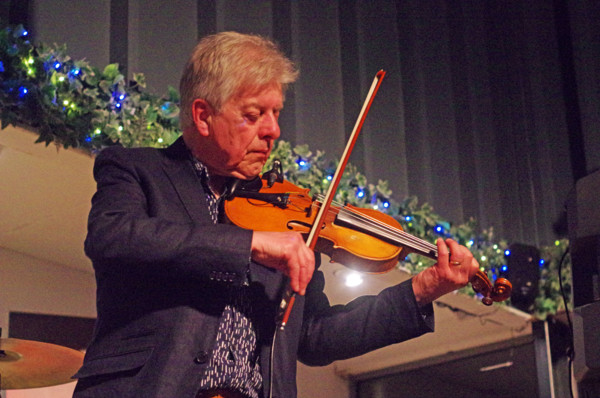 Mike Piggott, East Grinstead Jazz Club, Apron Café, Chequer Mead Theatre, West Sussex, April 2025. Creator: Brian O'Connor.
