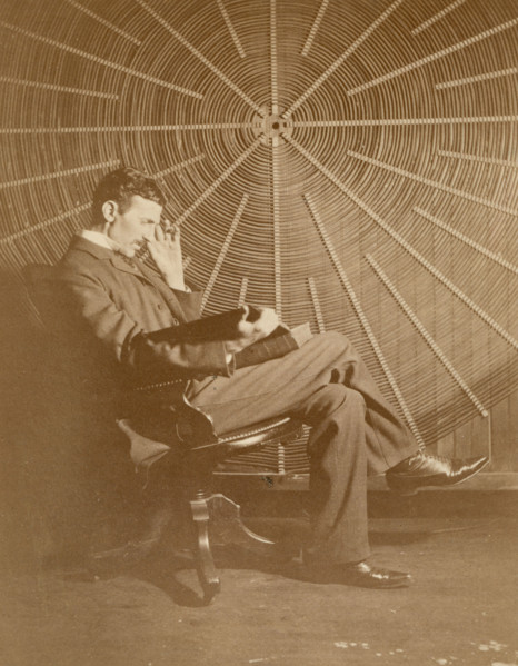 Nikola Tesla and his spiral oscillating transformer, 1896. Creator: Anonymous.