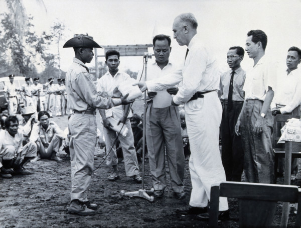 Fritz Ronnefeldt distributing medicine, c1940s. Creator: Unknown.