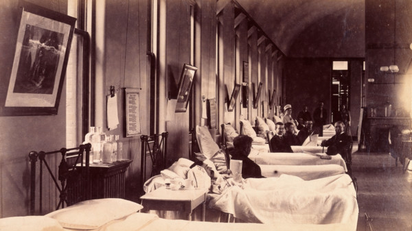 Bellevue Hospital, New York City: a ward for male patients with case-notes...,  c1885/1898. Creator: Unknown.