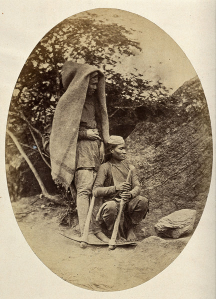 Nepal: two Tibetan men with pick-axes, c1860. Creator: Clarence Comyn Taylor.