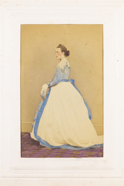 A man in drag standing side-on, [between 1890 and 1899?]. Creator: Unknown.