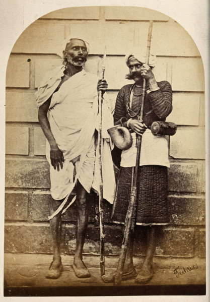 Oude, India: two men holding long sticks, c1860. Creator: Unknown.