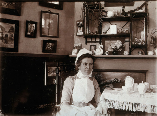 St Bartholomew's Hospital, London: a nurse taking tea, c1890. Creator: Unknown.