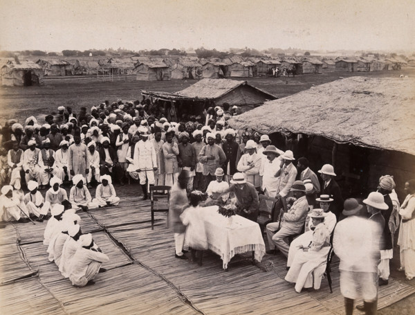 Discharged hospital patients after bubonic plague outbreak, being given relief money..., 1897. Creator: Unknown.