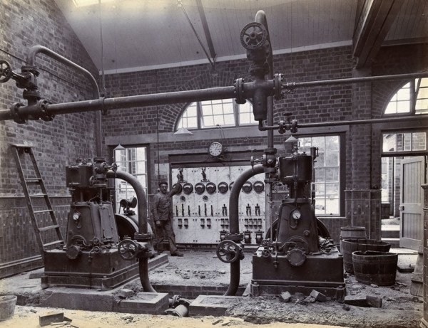 Johannesburg Hospital, South Africa: member of staff, possibly in the boiler room, c1905. Creator: Unknown.