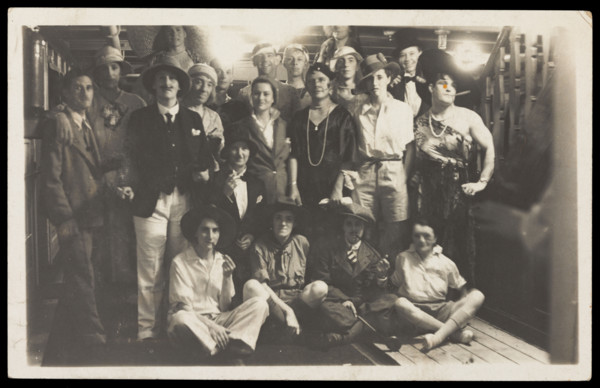 Passengers on RMS Armadale Castle, some in drag, pose for a group portrait, 1933. Creator: Unknown.