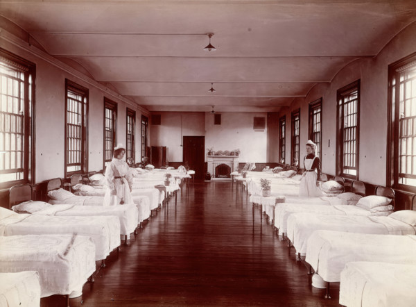 Claybury Asylum, Woodford, Essex: a dormitory, (1893?). Creator: London & County Photographic Co.