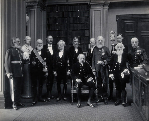 Fellows of the Royal Society: Sir John Evans, bust of Sir Isaac Newton, Lord Kelvin, RB Clifton... Creator: Mayall.