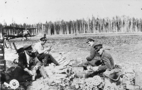 Royal Engineers Special Brigade officers and Thomas Davies’ servant assembling M bombs..., 1919. Creator: Unknown.