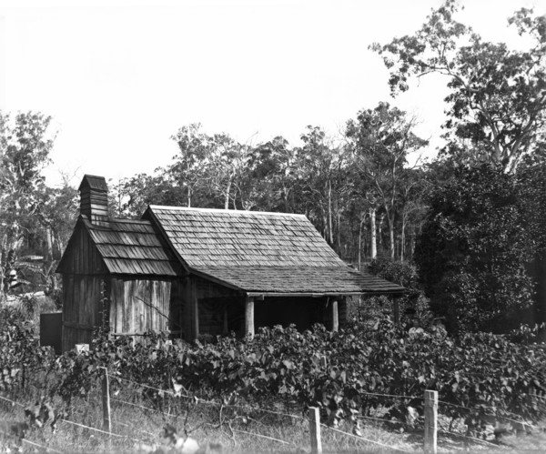 Australian wooden slab hut, wooden shingle roof, c1900s. Creator: Robert Augustus Henry L'Estrange.