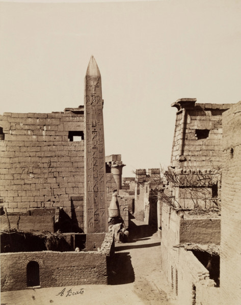Entrance to Temple of Luxor with Modern Mud-Brick Houses. Luxor, East Bank, between 1860 and 1903. Creator: Antonio Beato.