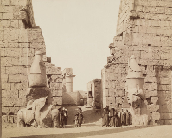 Entrance to Temple of Luxor with Colossal Statues of Luxor, East Bank Ramesses, between 1860 & 1903. Creator: Antonio Beato.