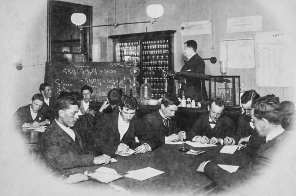 Dr Wilton W.R. Love teaching class with Chemistry/Pharmacy students, 1894. Creator: Unknown.