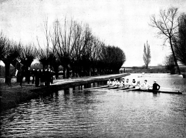 The Universities' Boat-Race: the Cambridge crew at practice - a word of advice from the coach, 1895. Creator: Stearn.