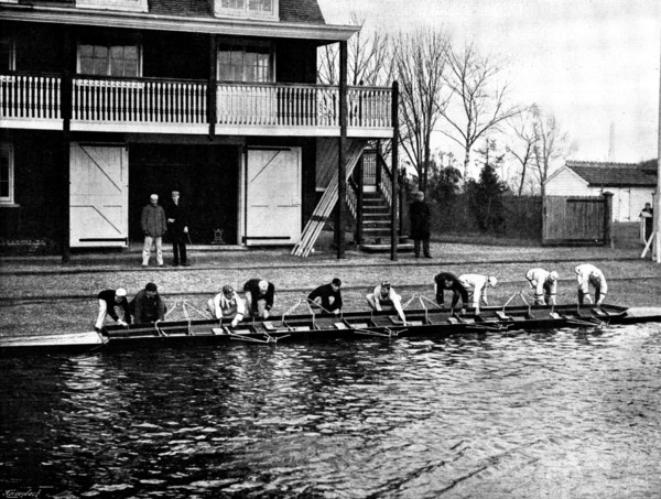 The Universities' Boat-Race: the Cambridge crew at practice - putting in the boat, 1895. Creator: Stearn.