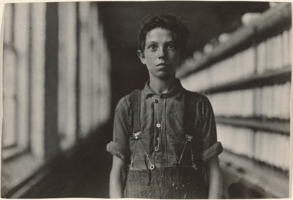 Jo Bodeon, a \back-roper\ in mule room. Chase Cotton Mill, Burlington, Vermont, 1909. Creator: Lewis Wickes Hine.