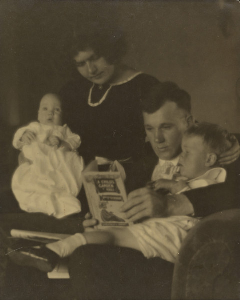 Family Portrait with A Child's Garden of Verses, about 1920. Creator: Louis Fleckenstein.
