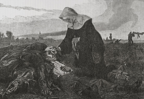 Franco-Prussian War (1870-71): Sisters of Charity on the battlefield, tending to the wounded, 1870.  Creator: Unknown.