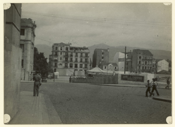 Street scene, Spain, early-mid 20th century. Creator: Edward Morland Lewis.
