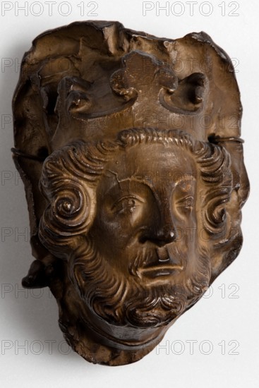 Cast of bearded male head with crown, possibly from Lichfield Cathedral. Creator: Unknown.