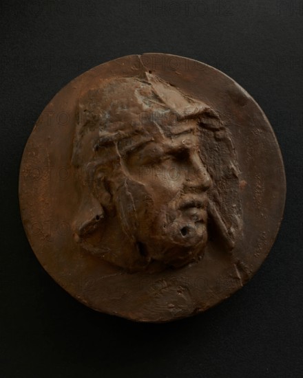 Cast of head of barbarian auxiliary with moustache in helmet. Creator: Unknown.