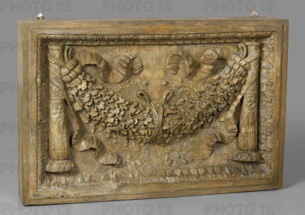 Cast of panel with oak-leaf garland between candelabra, late 18th century-early 19th century. Creator: Unknown.