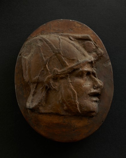 Cast of head of Eastern archer with helmet. Creator: Unknown.