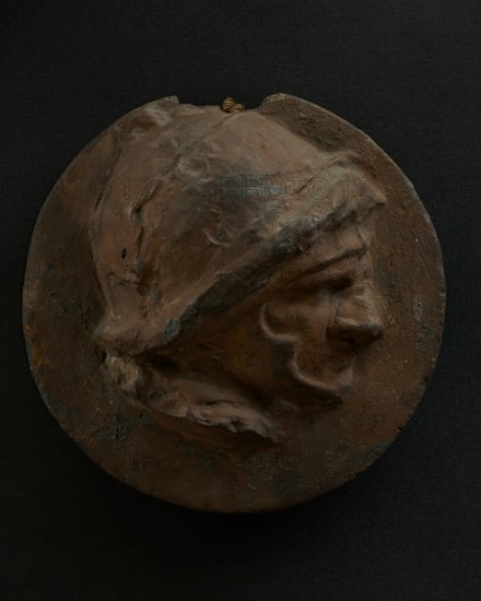Cast of foreshortened head of Roman soldier in helmet. Creator: Unknown.