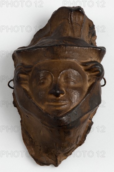 Brown painted plaster cast of head with head-dress, c1850. Creator: Unknown.