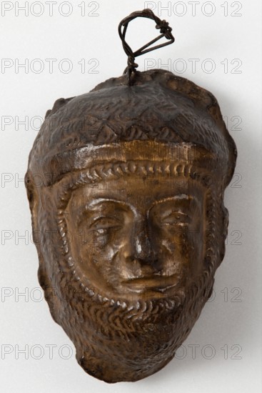 Brown painted plaster cast of male figure in armour or chain mail, c1850. Creator: Unknown.