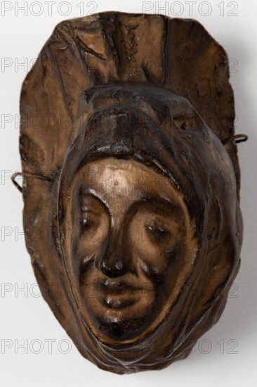 Brown painted plaster cast of cloaked head, c1850. Creator: Unknown.