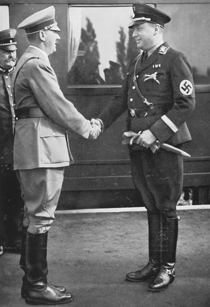 Hitler greeting his minister Darré, 1934