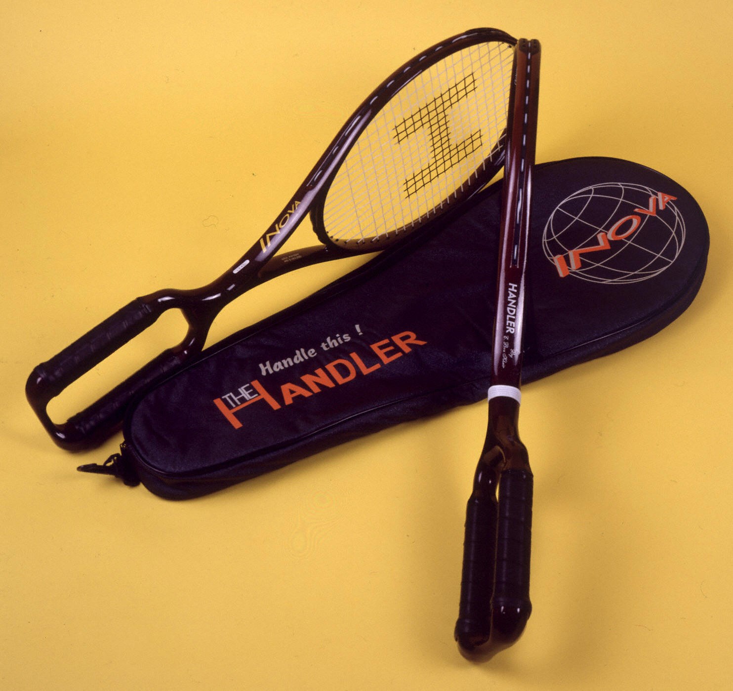 Tennis racket, two handled